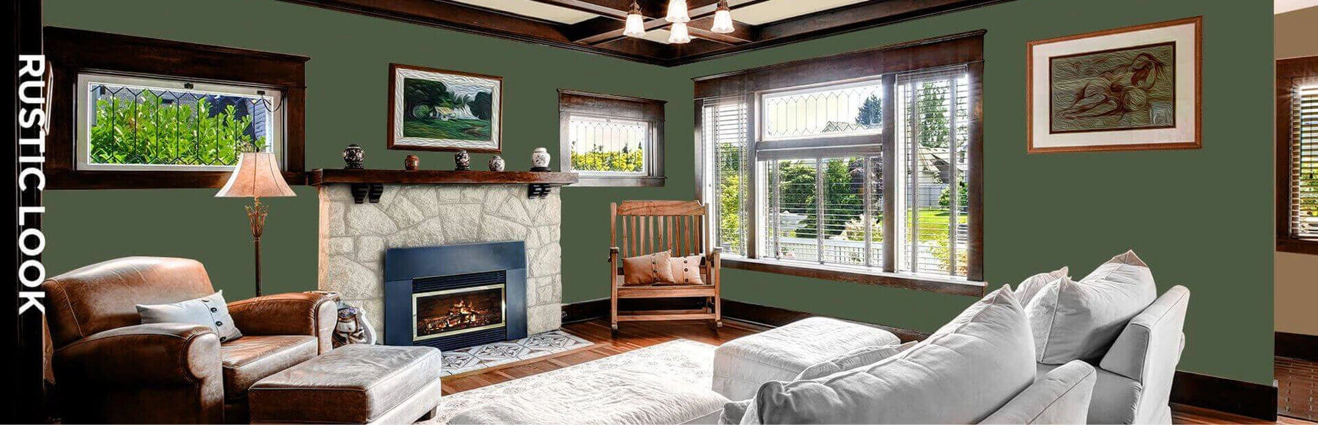 Rustic style living room in tan, forest green, and brown, featuring furniture and paintings on walls.