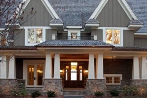 Columned two story home entrance.