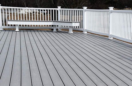 Newly painted deck with grey and white paint