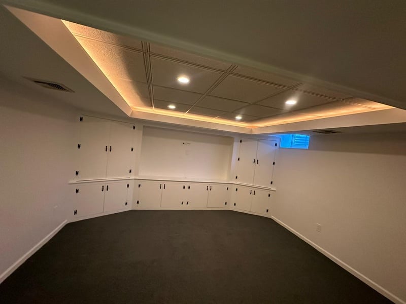 white walls white built in flush wall cabinets ceiling tiles