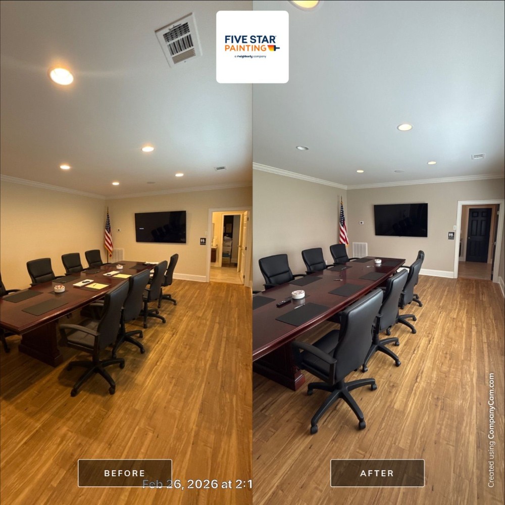 Commercial conference room refresh using Sherwin Williams SW7551 Greek Villa satin sheen trim, SW7036 Accessible Beige Matte walls and SW6258 Tricorn Black satin on doors.