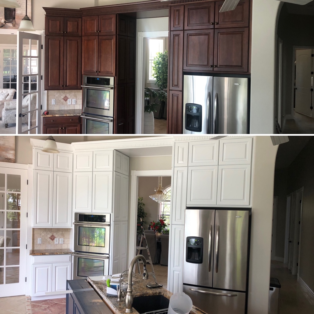 Dark wood cabinets finished in classic white