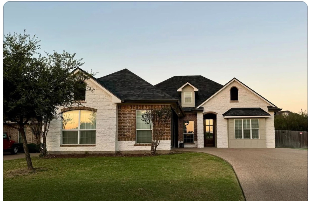 Exterior home with white rock stain