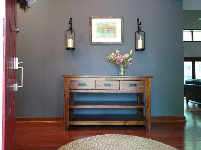 Deep Grayish Blue wall with brown table