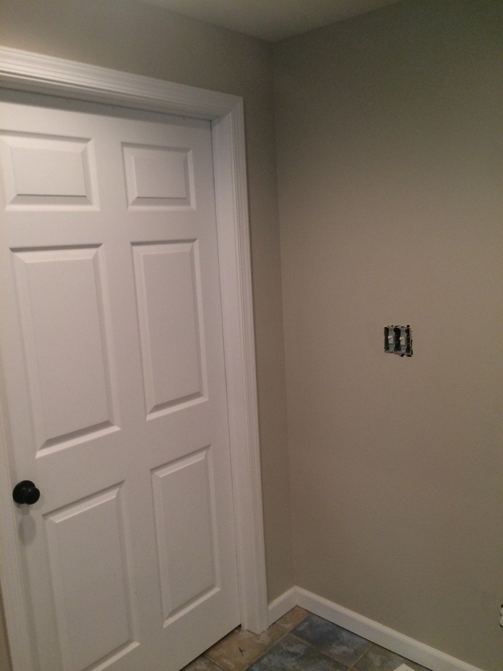 Gray wall and white trim