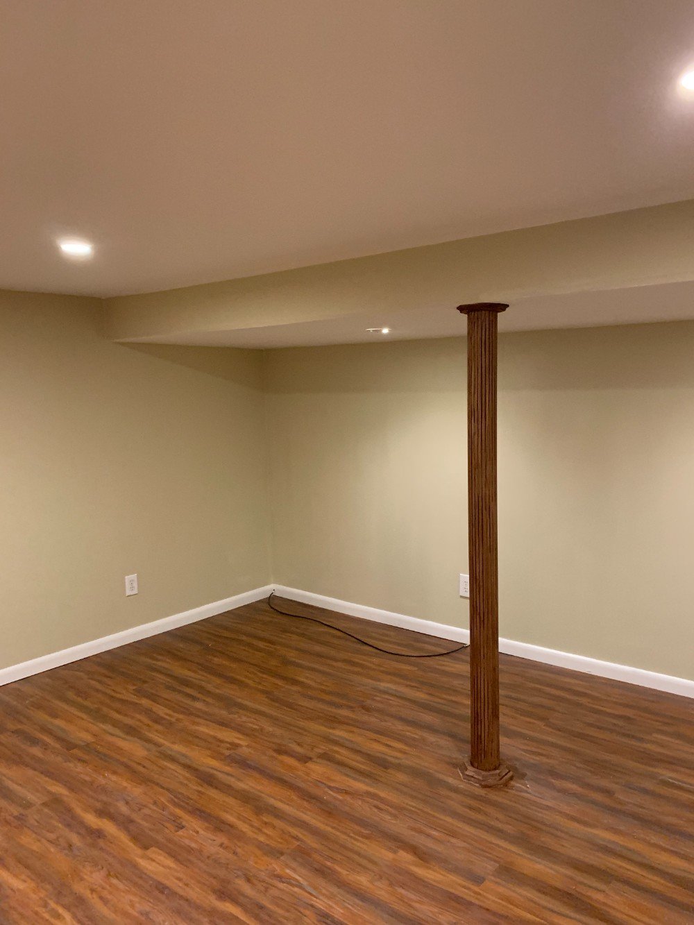 Interior basement painting with neutral tones in Somerset, NJ.