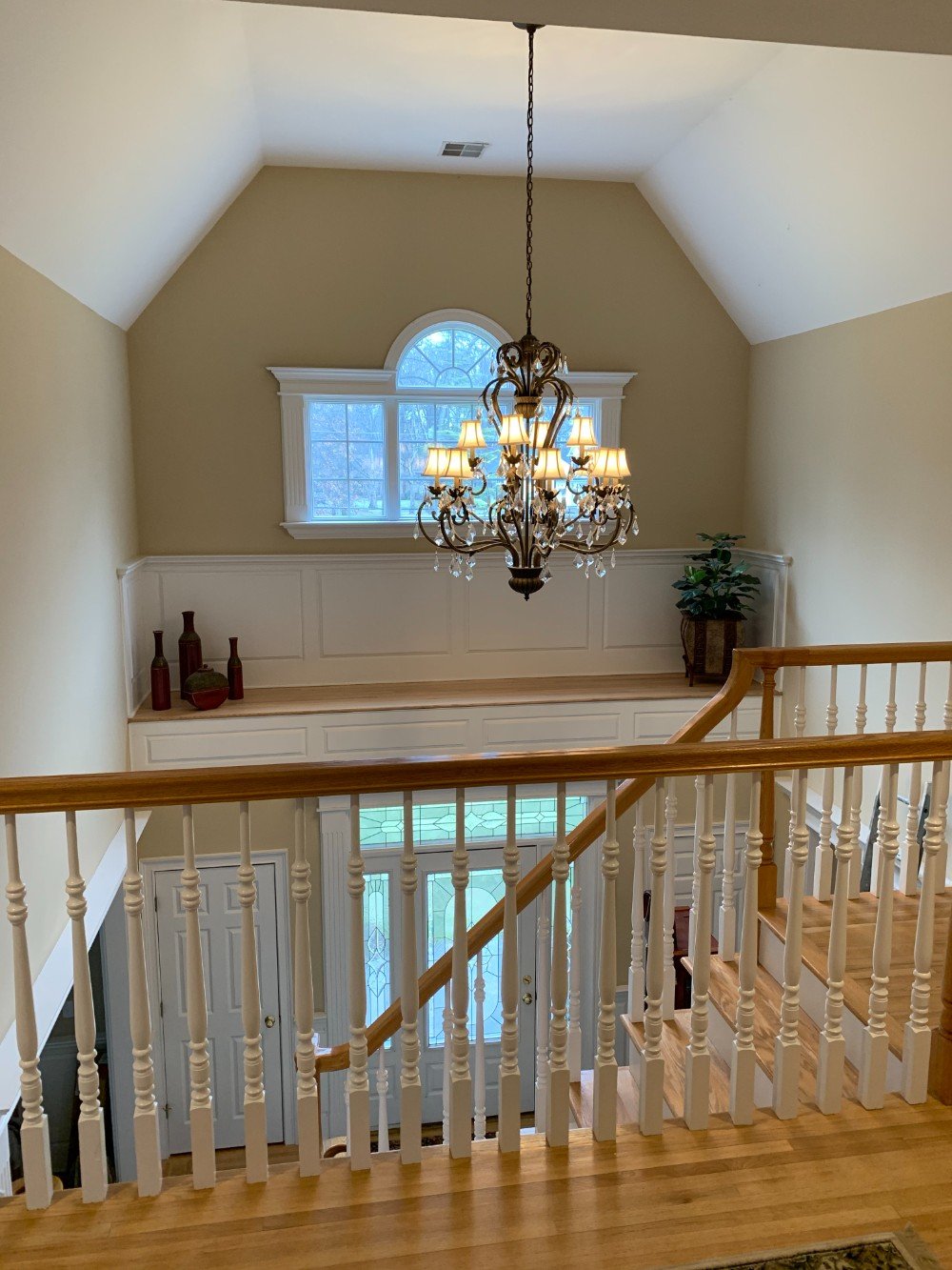 Matawan foyer painted in classic beige with white trim