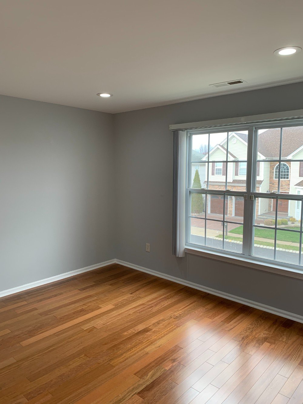Interior bedroom painting with neutral tones in Middletown home.