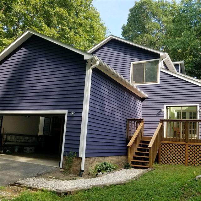 Purple house  Servicing Raleigh, Durham, Chapel Hill, Wake Forest, Brier Creek, Hillsbourough, Pittsboro, Rolesville with Sherwin Williams, Ben Moore paints for Interior, Exterior, cabinets, Decks, & commerical