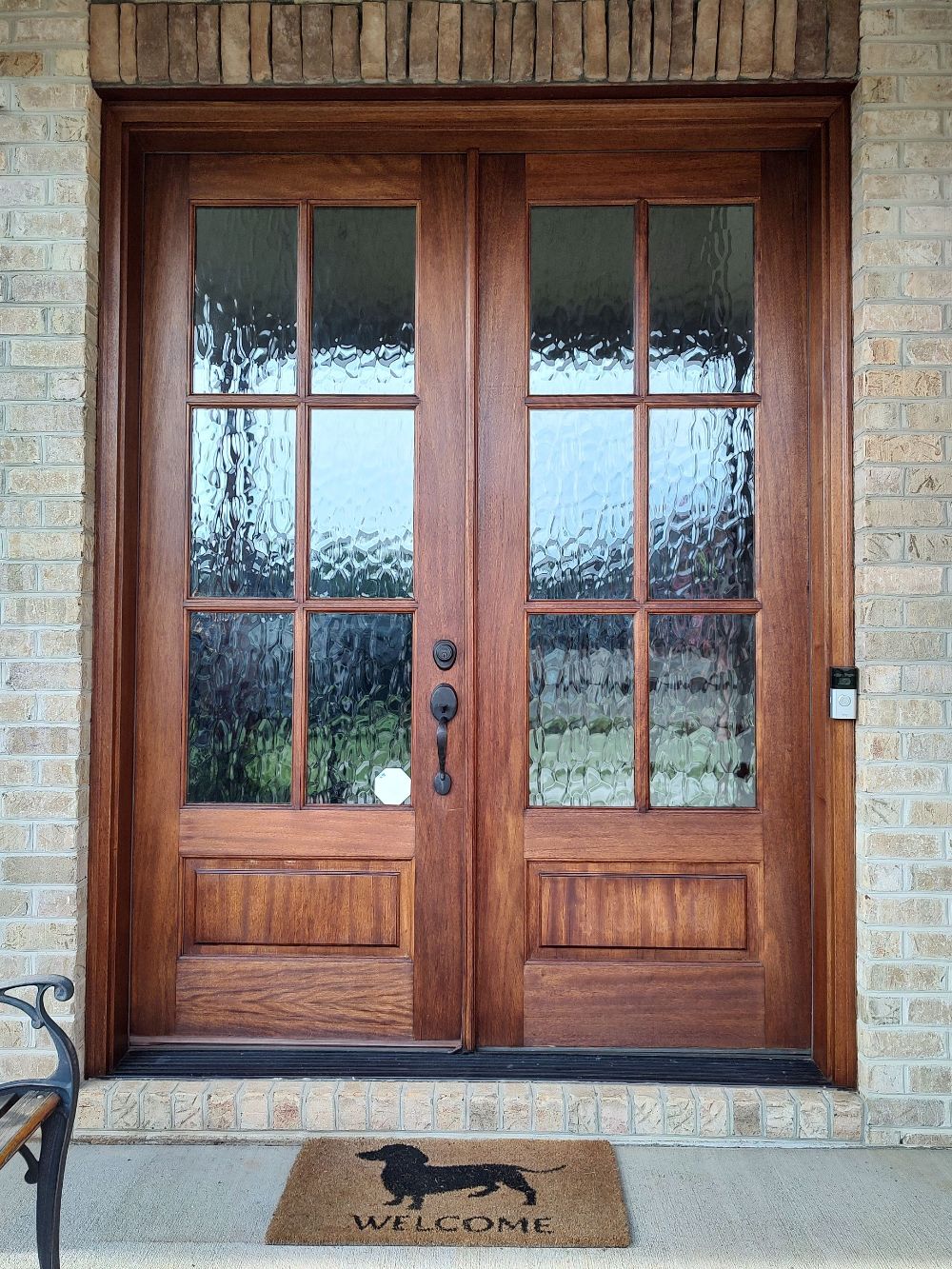 Re-stain wood front doors and frame