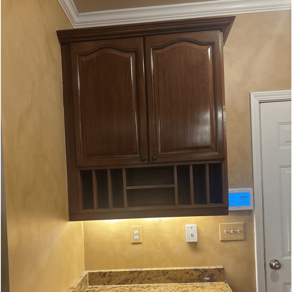Rich, glossy cabinet refinish with smooth detail