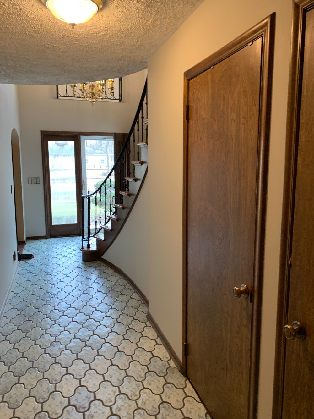 Well-lit hallway in Somerset, NJ with freshly painted light-colored walls