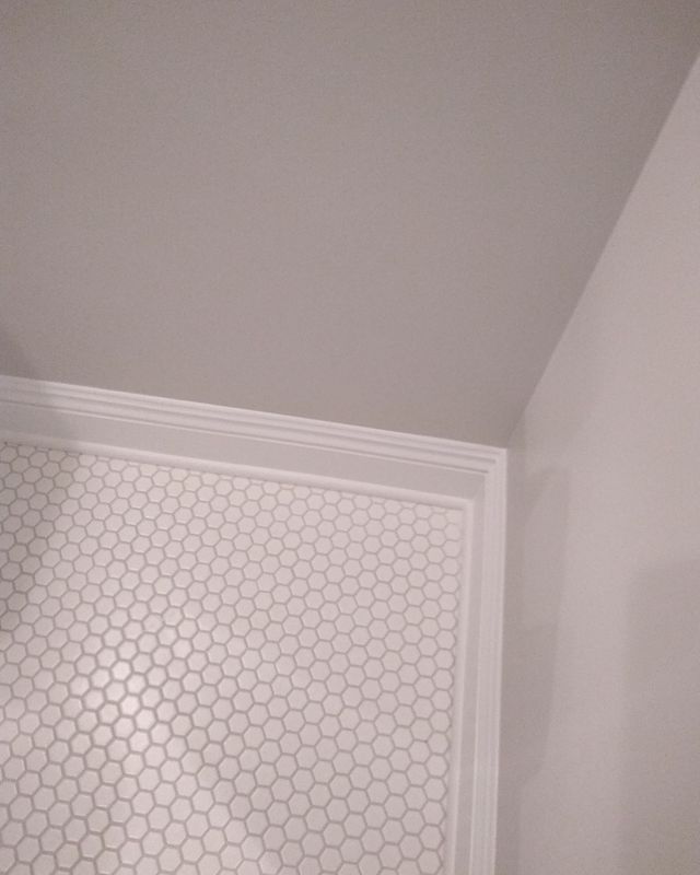 White flooring and baseboards