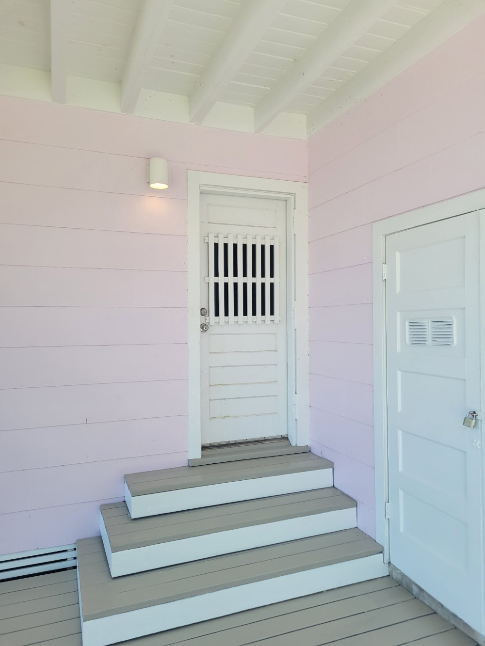 island home pink entry with deck