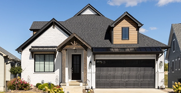 Exterior of a painted brick home.