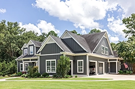 Exterior of a home painted a dark grey color.