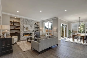 Beautiful living room with walls and ceiling painted grey and trim painted white.