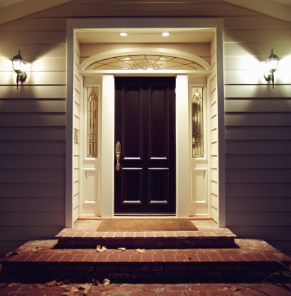 Solid door in well lit entryway