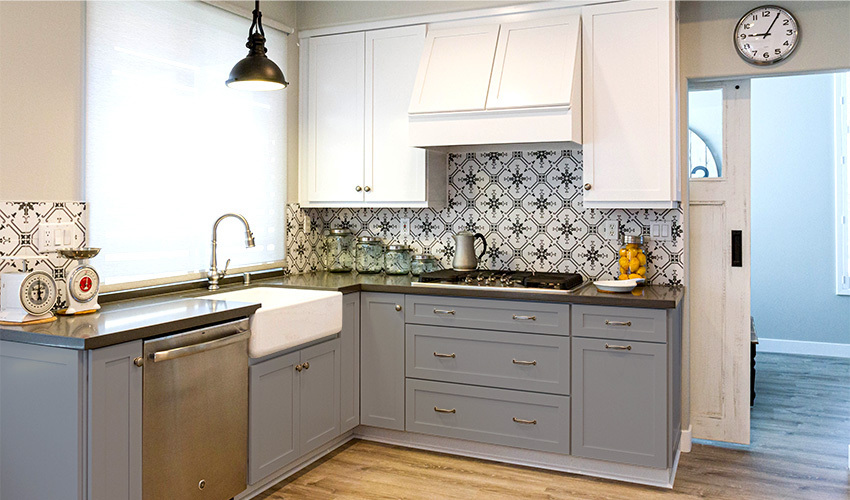 White and gray painted kitchen cabinets