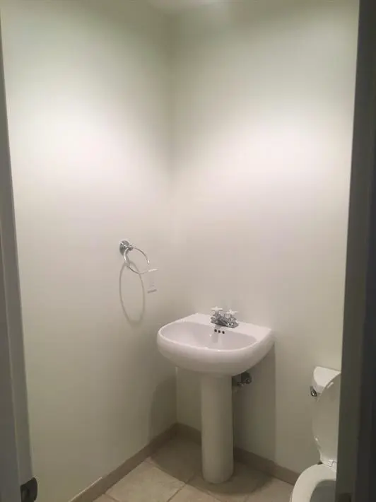 Bathroom with sink and toilet