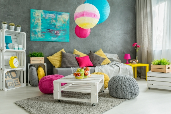 Modern living room with couch and multi-color scheme design.