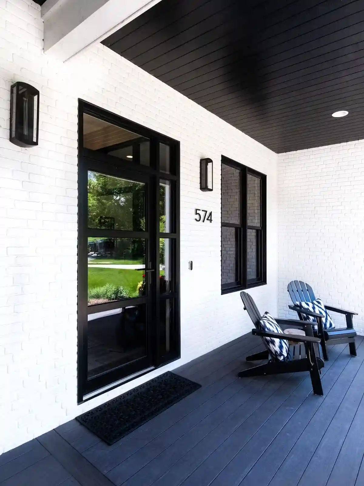 Modern house porch exterior with white painted brick.