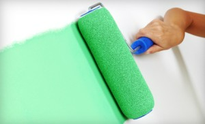 Green Paint Roller on Wall