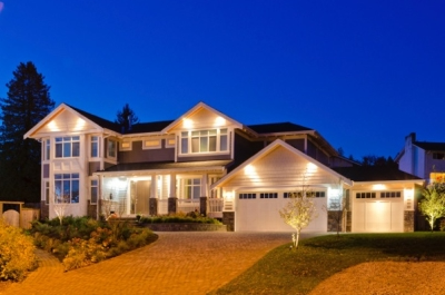 outdoor home lit up with lights.
