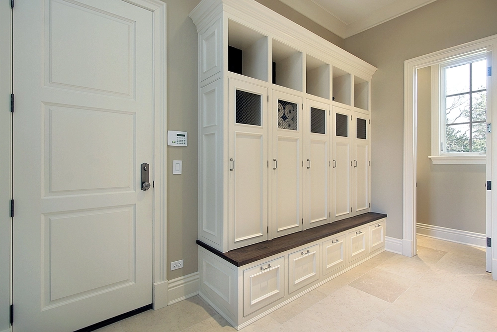 White cabinets against beige wall