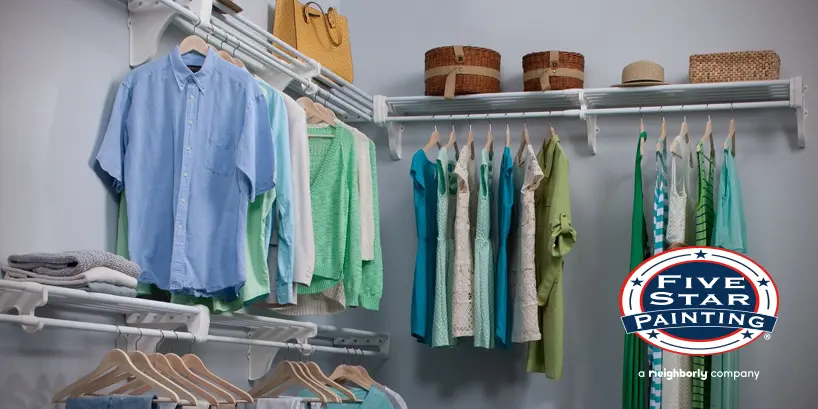 Photo of a closet with several pieces of clothing hanging, Five Star Painting logo on the bottom right