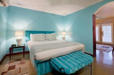 Master bedroom with light blue walls   