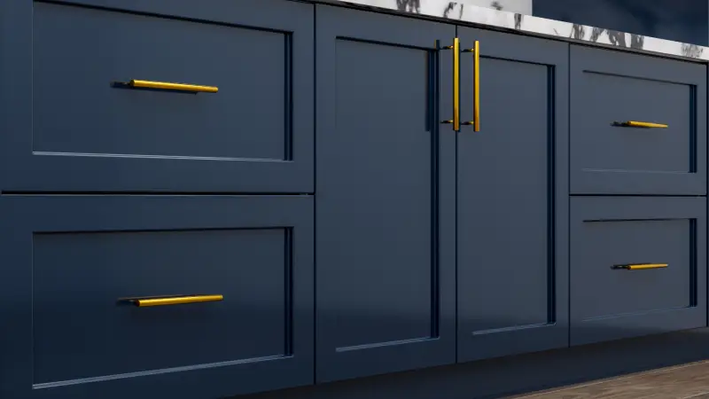 navy kitchen cabinets with long gold handles