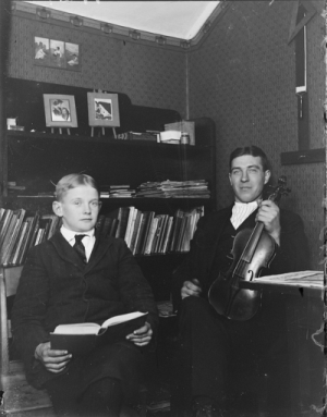 Old-fashioned Photo of Two Men Reading