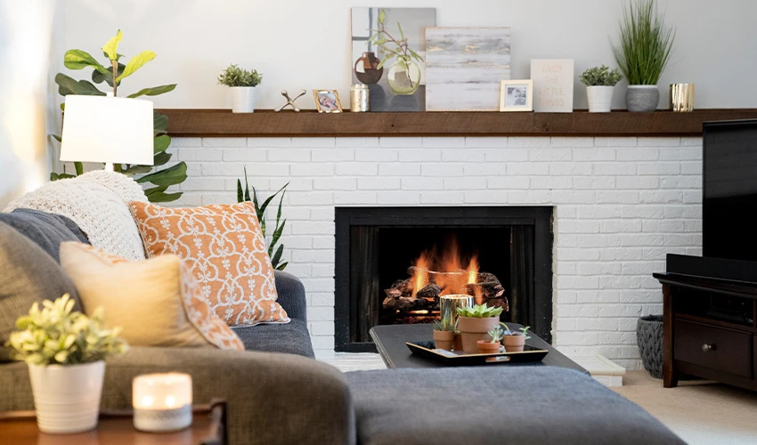 Cozy living room with sofa and fireplace