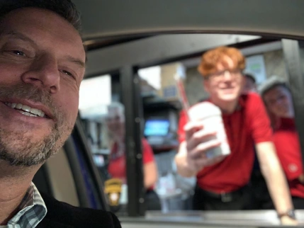 Scott at fast food drive through