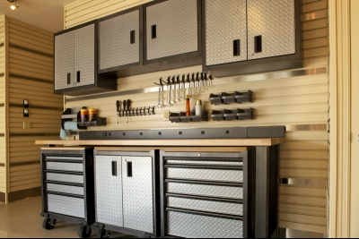 Silver and black garage work bench and cabinets  