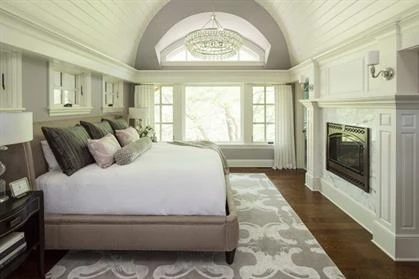 Bedroom with fireplace.
