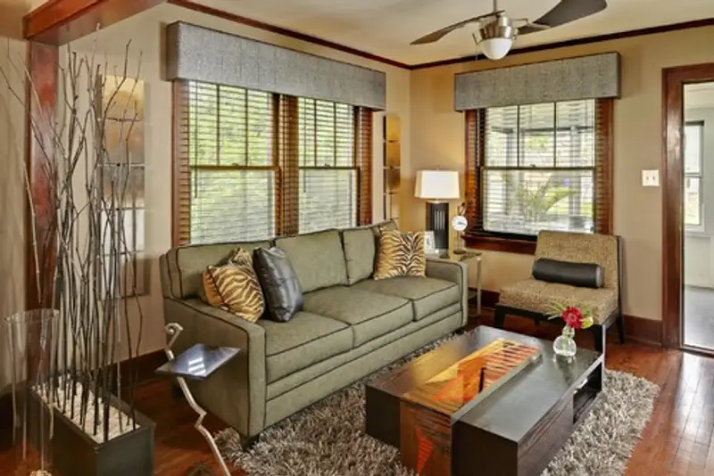 Living room with wooden accents and pale yellow walls