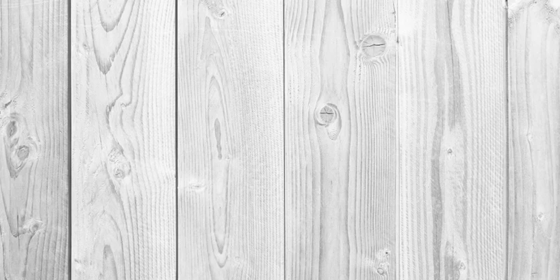 Photo of a weathered whitewashed wooden deck