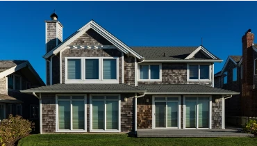 Exterior view of home with cedar siding