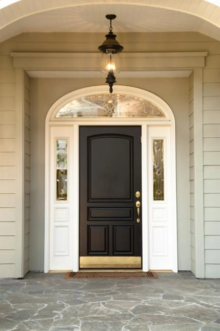 Dark brown door with white frame