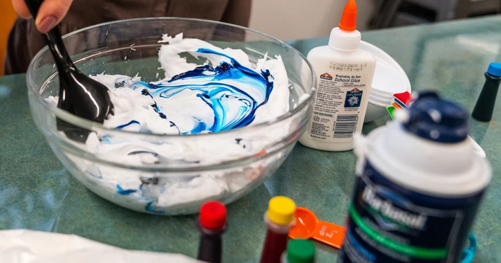 Person making puffy paint