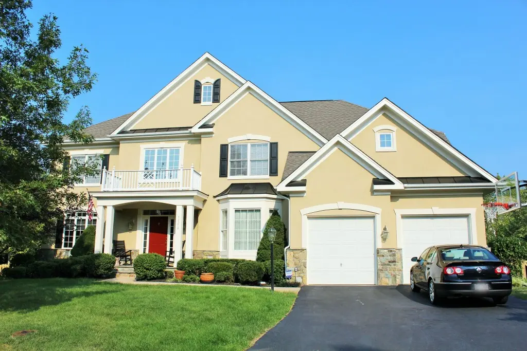 yellow two-story home