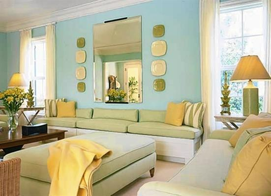 Living room with light blue walls and yellow accents