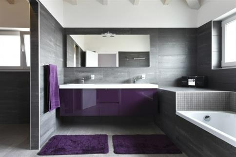 Bathroom with grey walls and purple accents