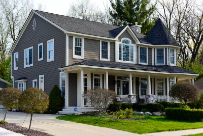 House with new grey and white exterior paint job.