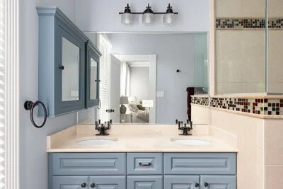 Master Bathroom with Off Gray Cabinets and Gray Walls