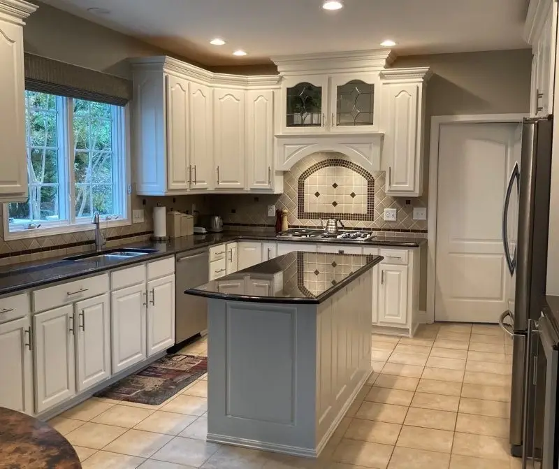 Cabinet refinishing in the kitchen done by Five Star Painting