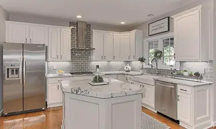 White cabinets after being painted by Five Star Painting.