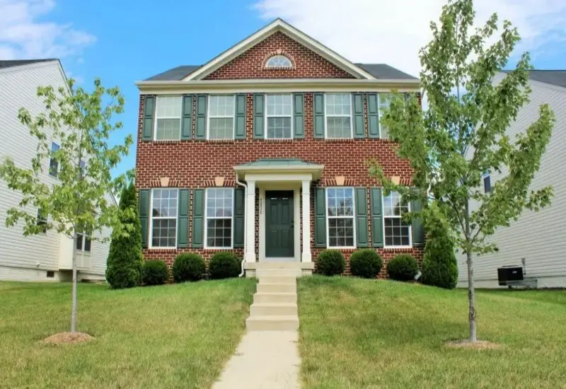 colonial house with brick front